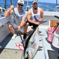 Two anglers with a yellowfin tuna and an E-Fish-Ent carbon fiber gaff