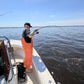 Inshore Reaper rod bent on a fish, angler in orange bibs