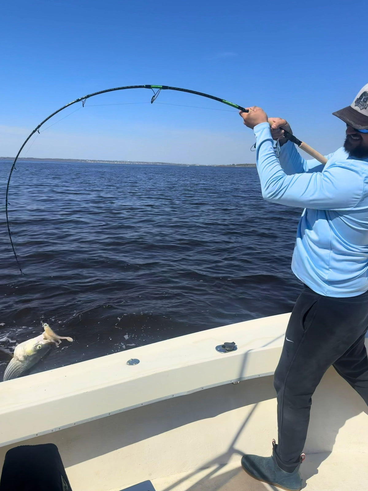 Inshore Reaper rod bent deep on a fish