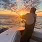 Fighting a fish on a Pelagic Sniper rod at sunset