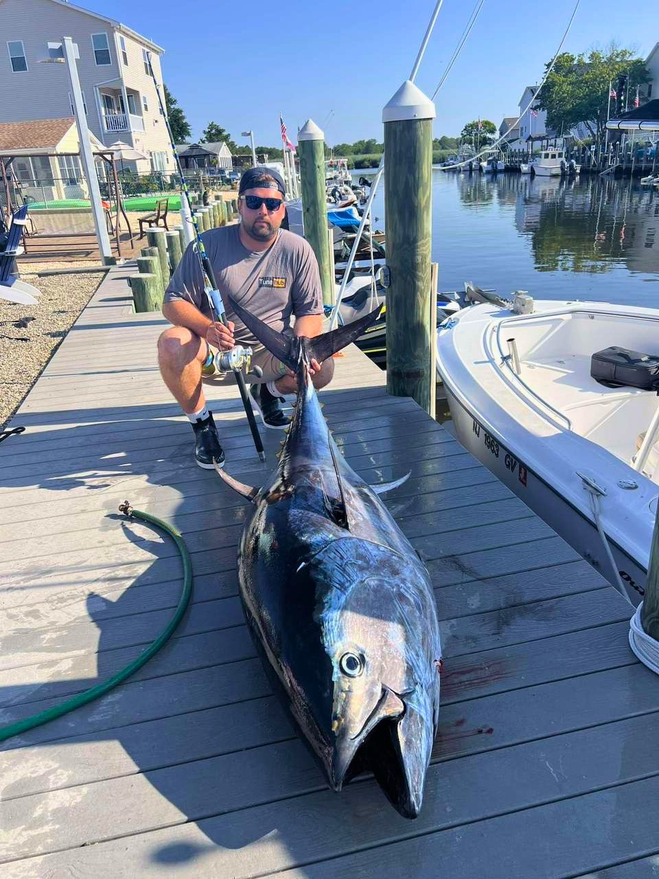 Bluefin tuna on the dock with the Phantom Jigger rod that caught it