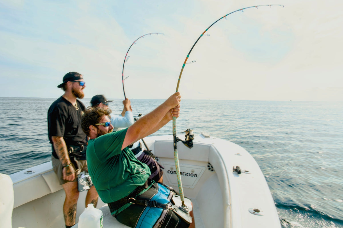 Two anglers hooked up at once on Vert Giant topwater rods