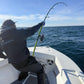 Angler fighting a fish on a Vert Giant topwater rod