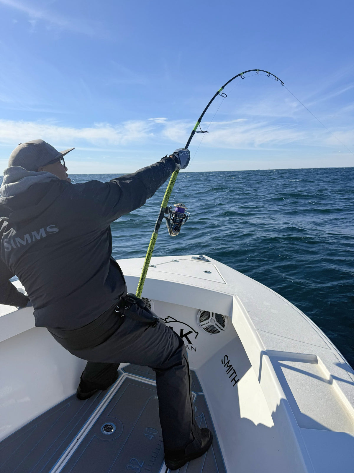 Angler fighting a fish on a Vert Giant topwater rod